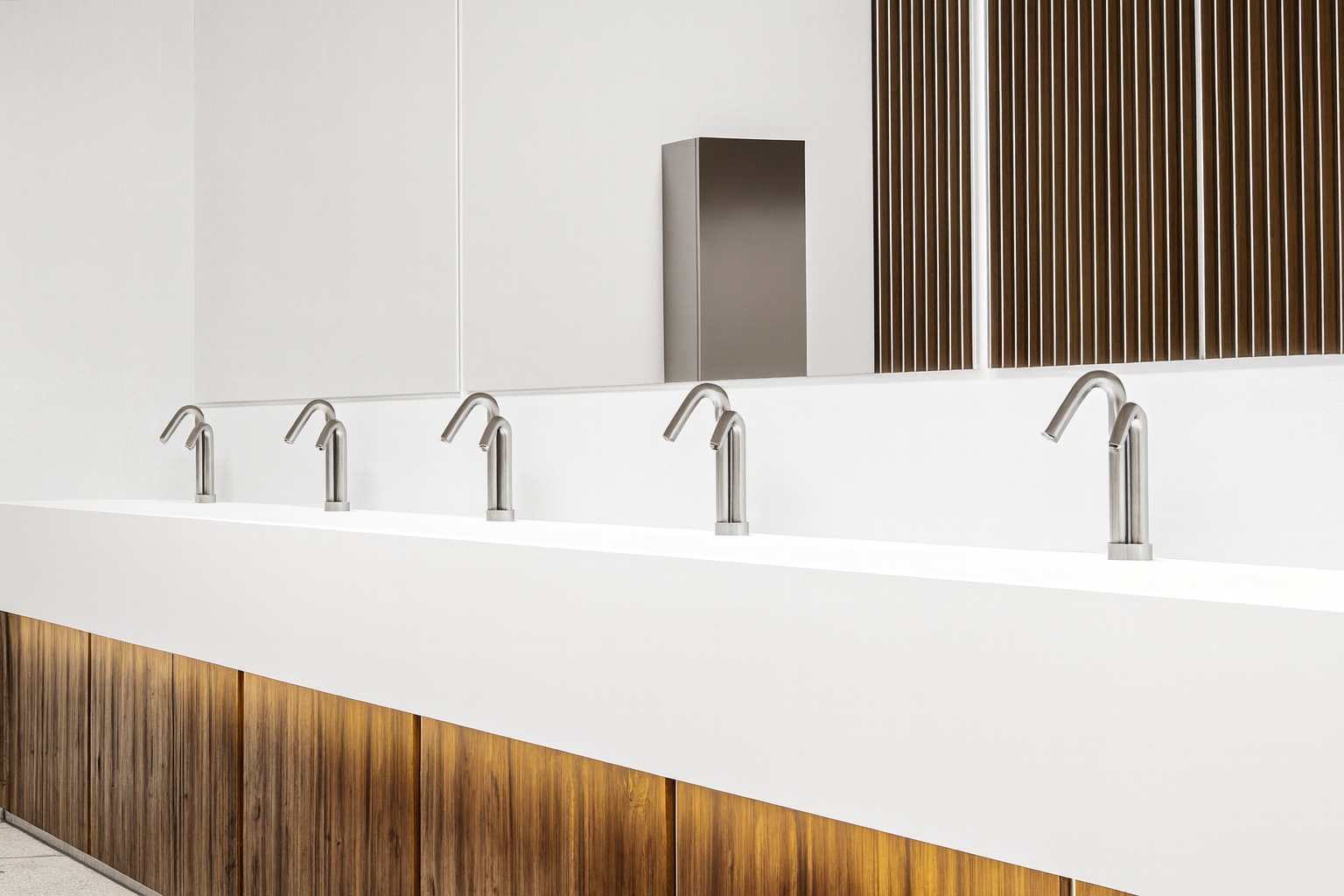 Fontana touchless faucets and soap dispensers in a commercial restroom